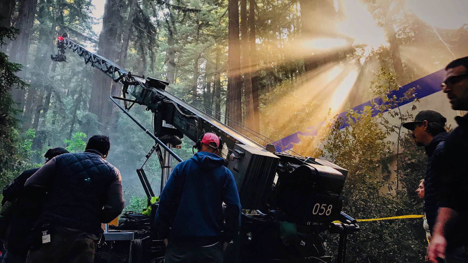 camera-crane-shooting-a-movie-in-the-forest-2021-08-30-23-36-19-utc